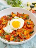 Chilaquiles with Sunny-Side-Up Eggs in a bowl with napkin for a diabetes friendly recipe