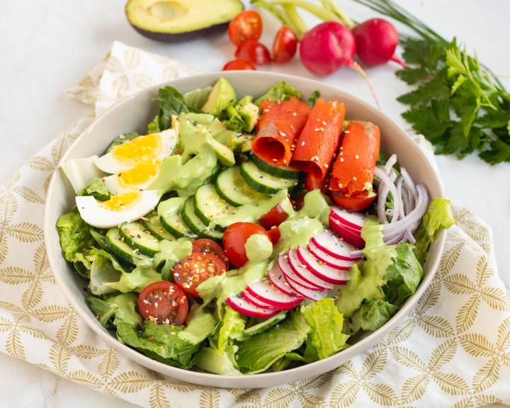 A bowl with a green goddess salad for a diabetic friendly meal that is low carb