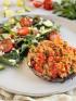 A plate with a very low carb keto meal of turkey stuffed mushroom and salad for diabetes friendly eating