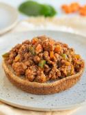 A plate with an open faced vegan vegetarian sloppy joes for a diet