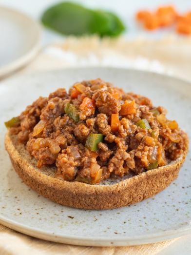 A plate with an open faced vegan vegetarian sloppy joes for a diet