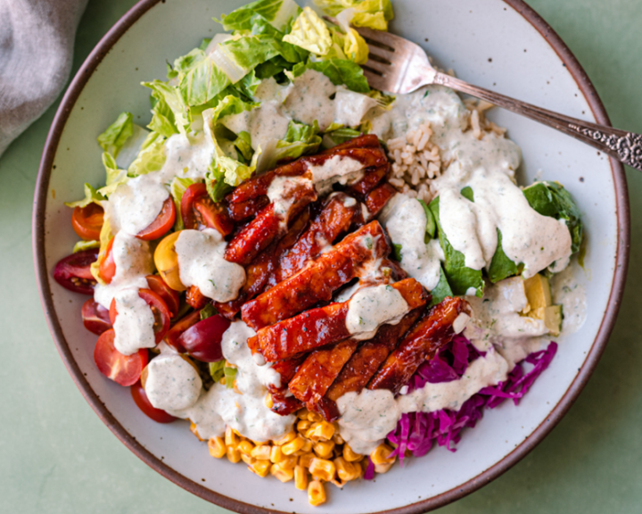 A plate of seared BBQ tempeh with a creamy salad for a diabetes friendly meal that is vegan vegetarian