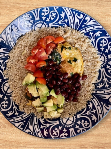 A bowl of vegetarian burrito ingredients